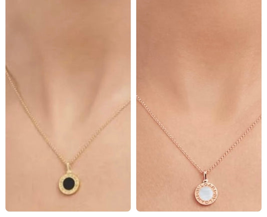 A Boutique Reversible Onyx Pendant Necklace