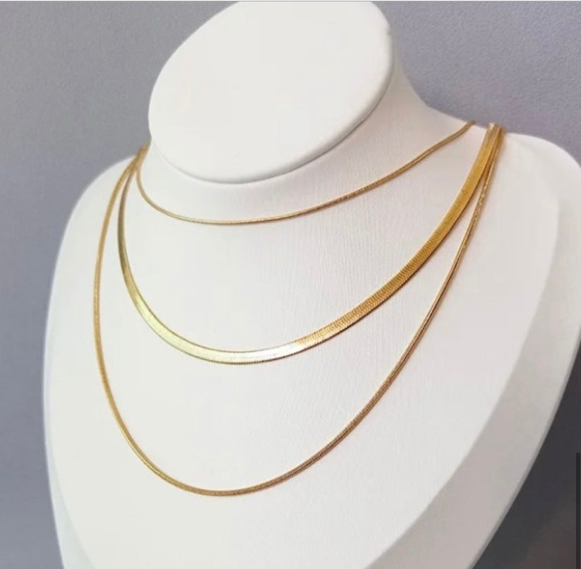 A. Herringbone Lana Gold Chocker Necklace